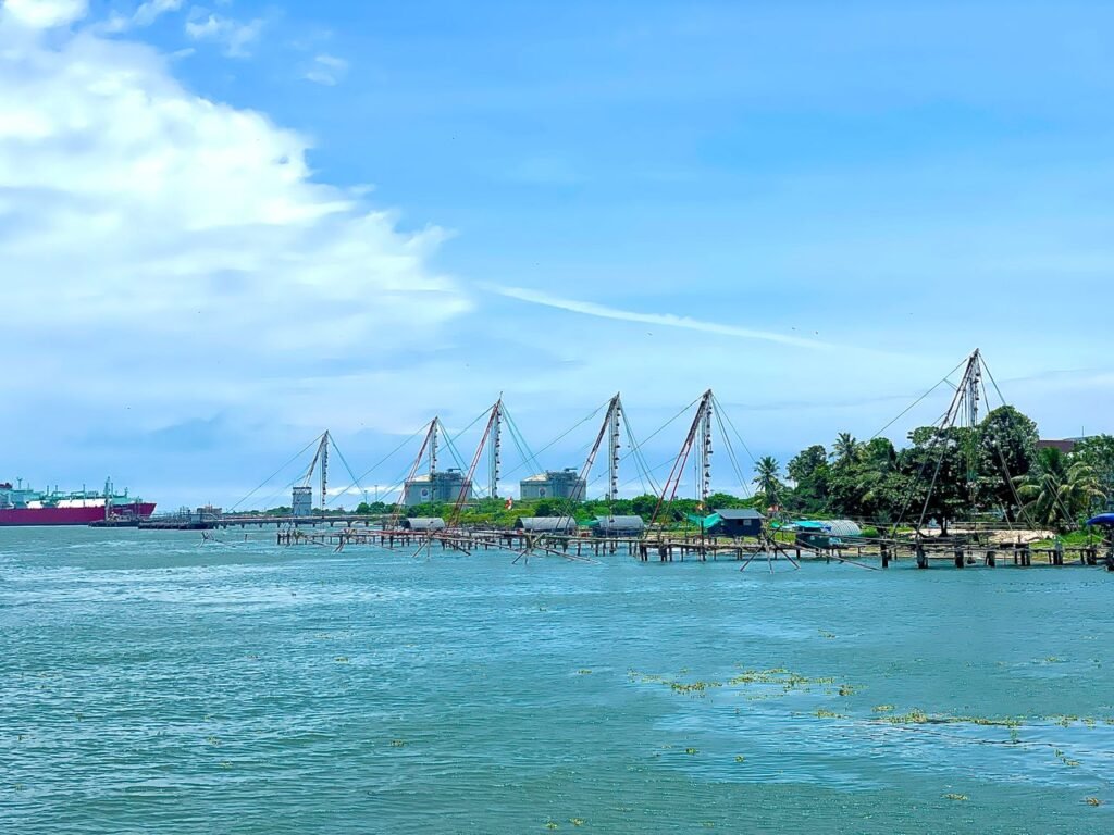 pexels photo 27833051 27833051 Traditional Chinese fishing nets line the waterfront in Cochin, India on a bright summer day.
