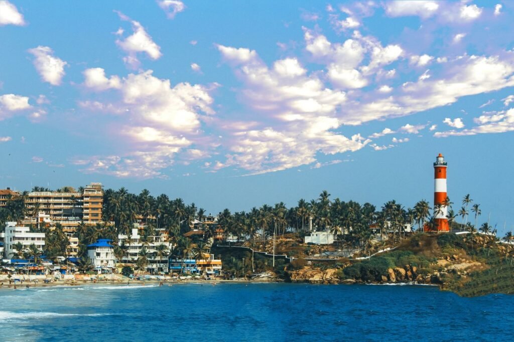 pexels photo 5245339 5245339 Aerial view of the iconic lighthouse and bustling beachfront in Kovalam, India.